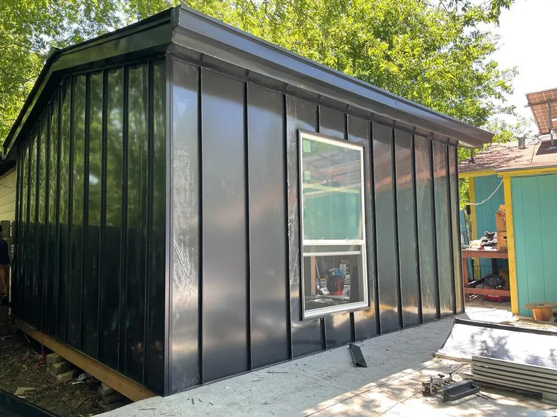 Black standing seam metal wall panels for Roof Inspection in Brookings